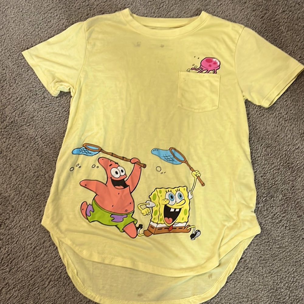 Yellow Spongebob shirt 65% polyester/35% Rayon.